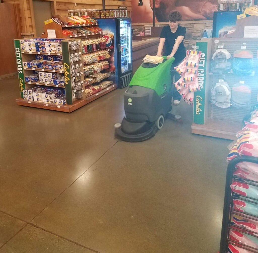 Commercial floor care service in Seattle performing VCT stripping and waxing in retail space